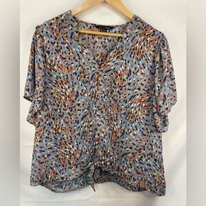 Zac & Rachel multi colored blouse, flutter sleeves and a faux tie front.